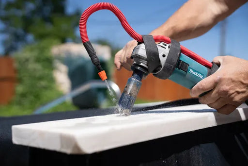 a person is using Hydro-Tail Controlled Water Attachment